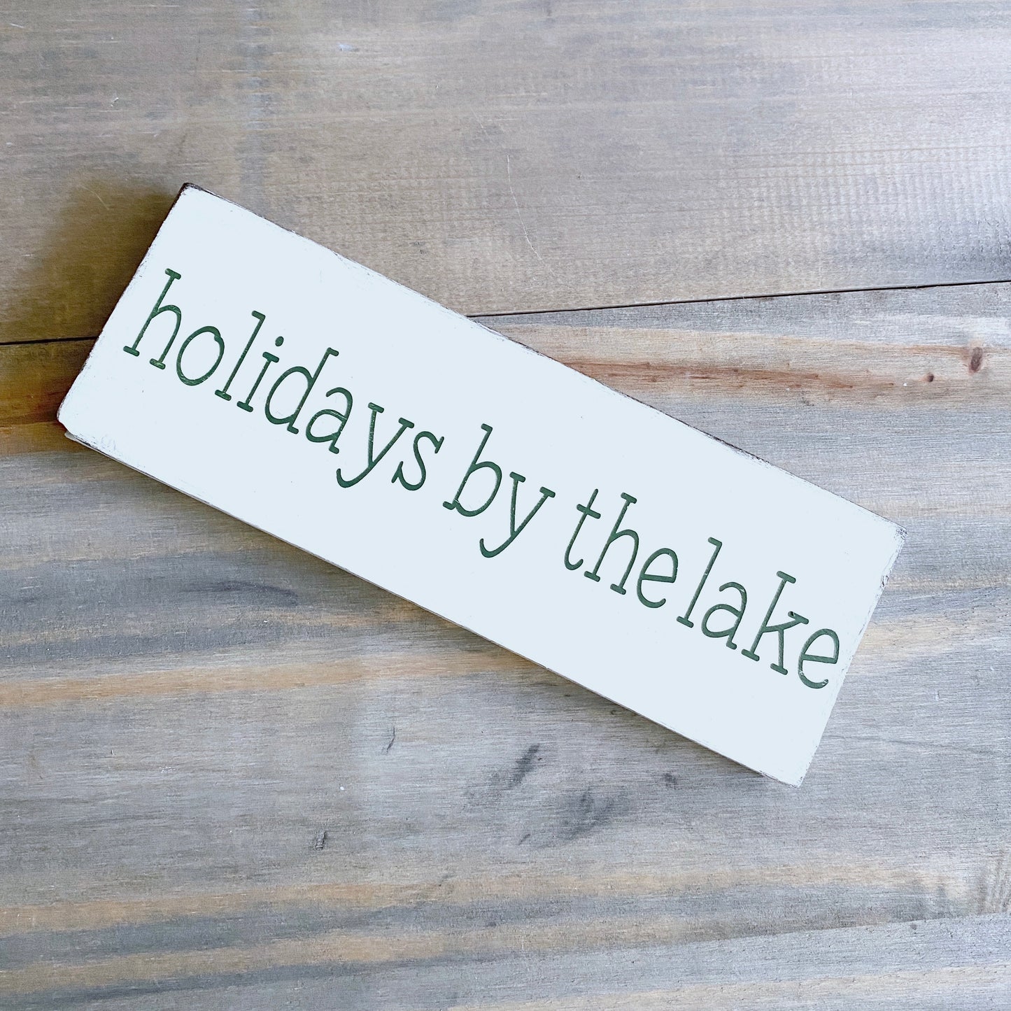 Holidays by the lake sign