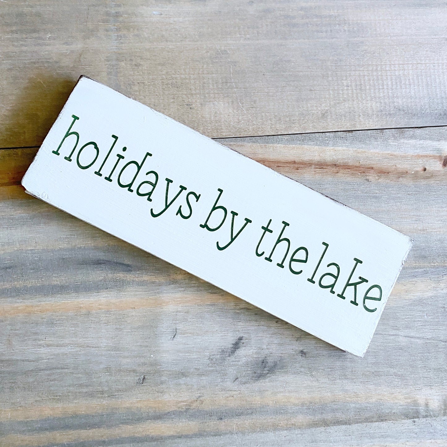 Holidays by the lake sign