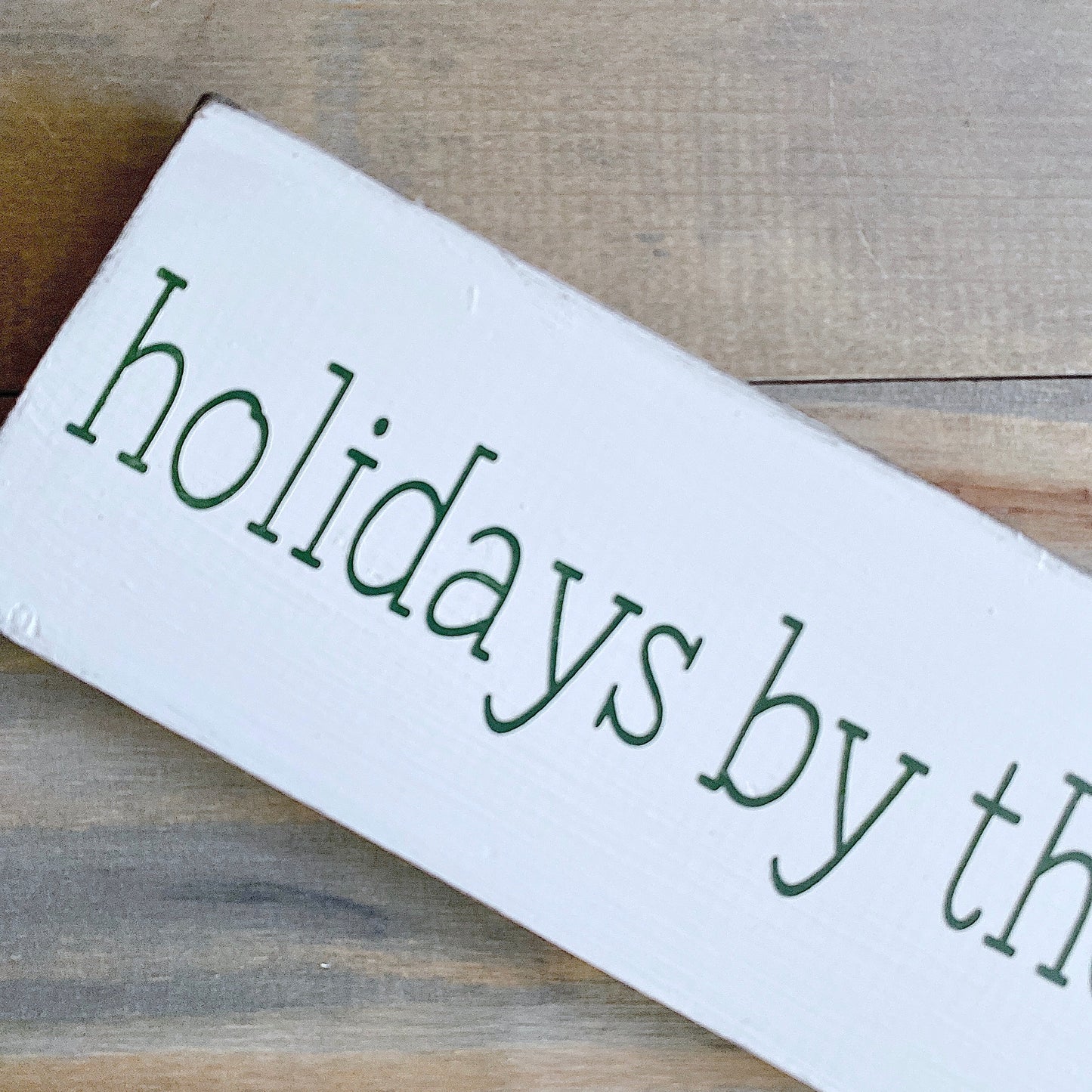 Holidays by the lake sign